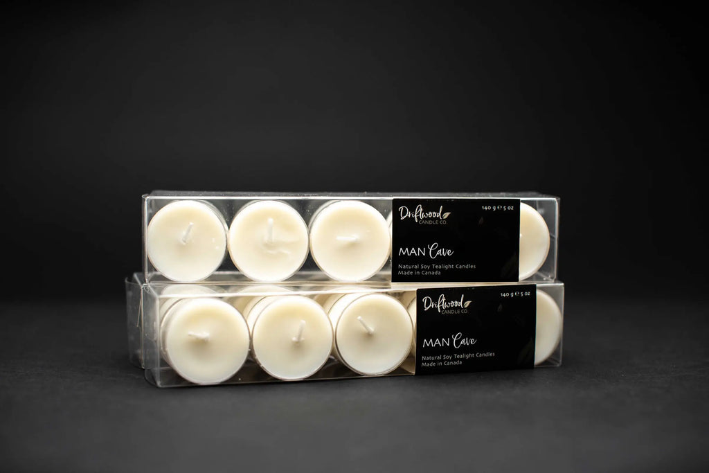 Set of two clear tealight boxes filled with ten tealights each and labelled with Driftwood Candle Co. Man Cave label.